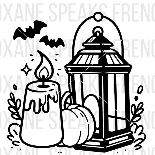 Halloween Decor with a candle, two bats, a pumpkin and a lantern