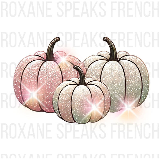 Trio of sparkling pink, white, and green pumpkins with glittery accents.