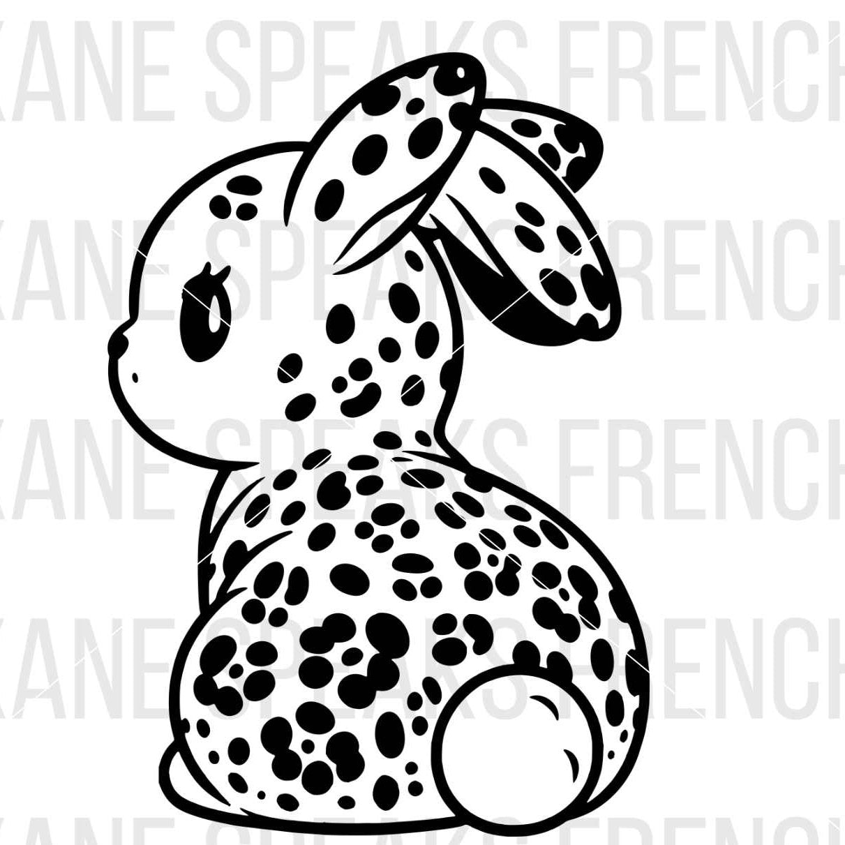 Black and white illustration of a spotted bunny sitting, facing to the left, with a cute and detailed design.